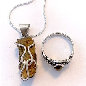 pretty set, rough I inch Tiger eye pendant and ring size 8 1/2